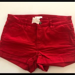 Red H & M shorts
